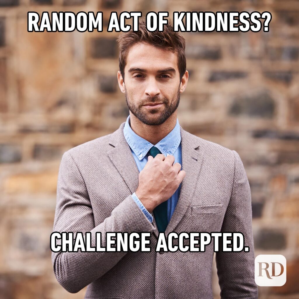 Random act of kindness? Challenge accepted. Man in a suit adjust his tie staring at the audience. 