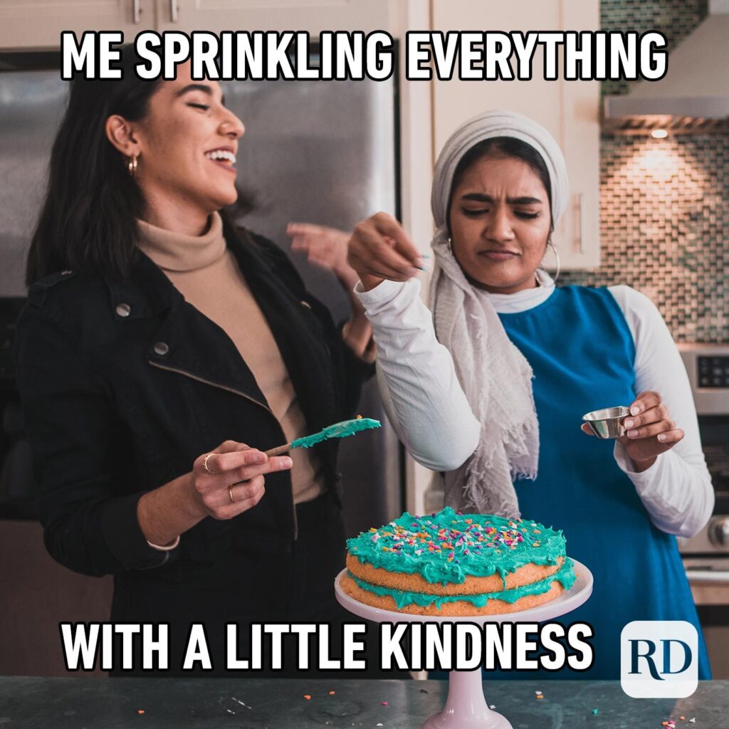 My sprinkling everything with a little kindness. Women sprinkling sprinkles on a two tier cake with turquoise frosting and another women laughing beside her.