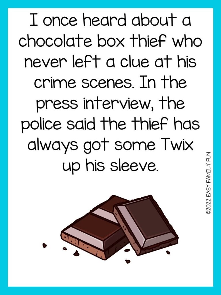 Two dark candy bars with brown crumbs on white cardstock and a light blue border. 